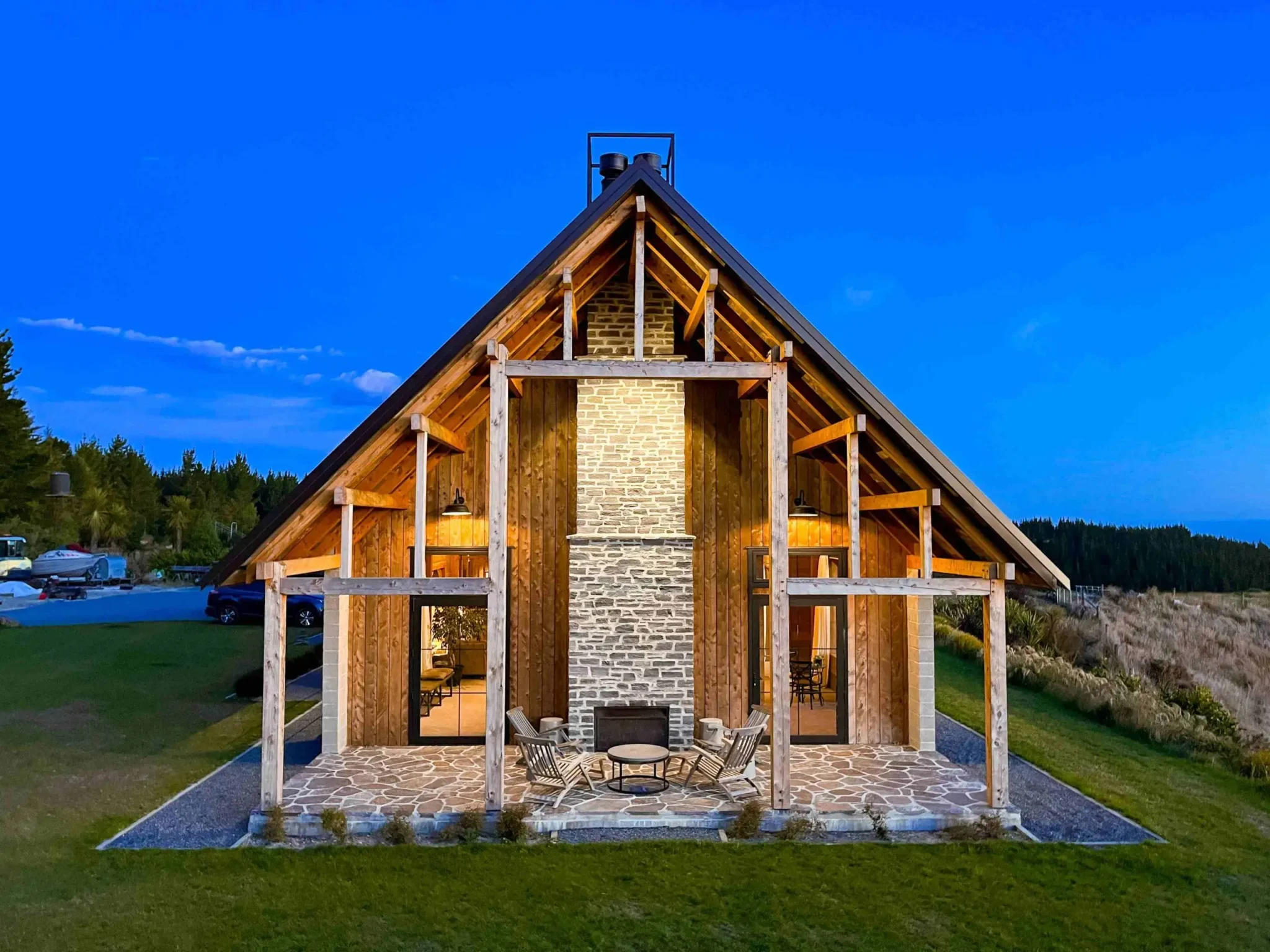Traditional English barn home with exposed trusses