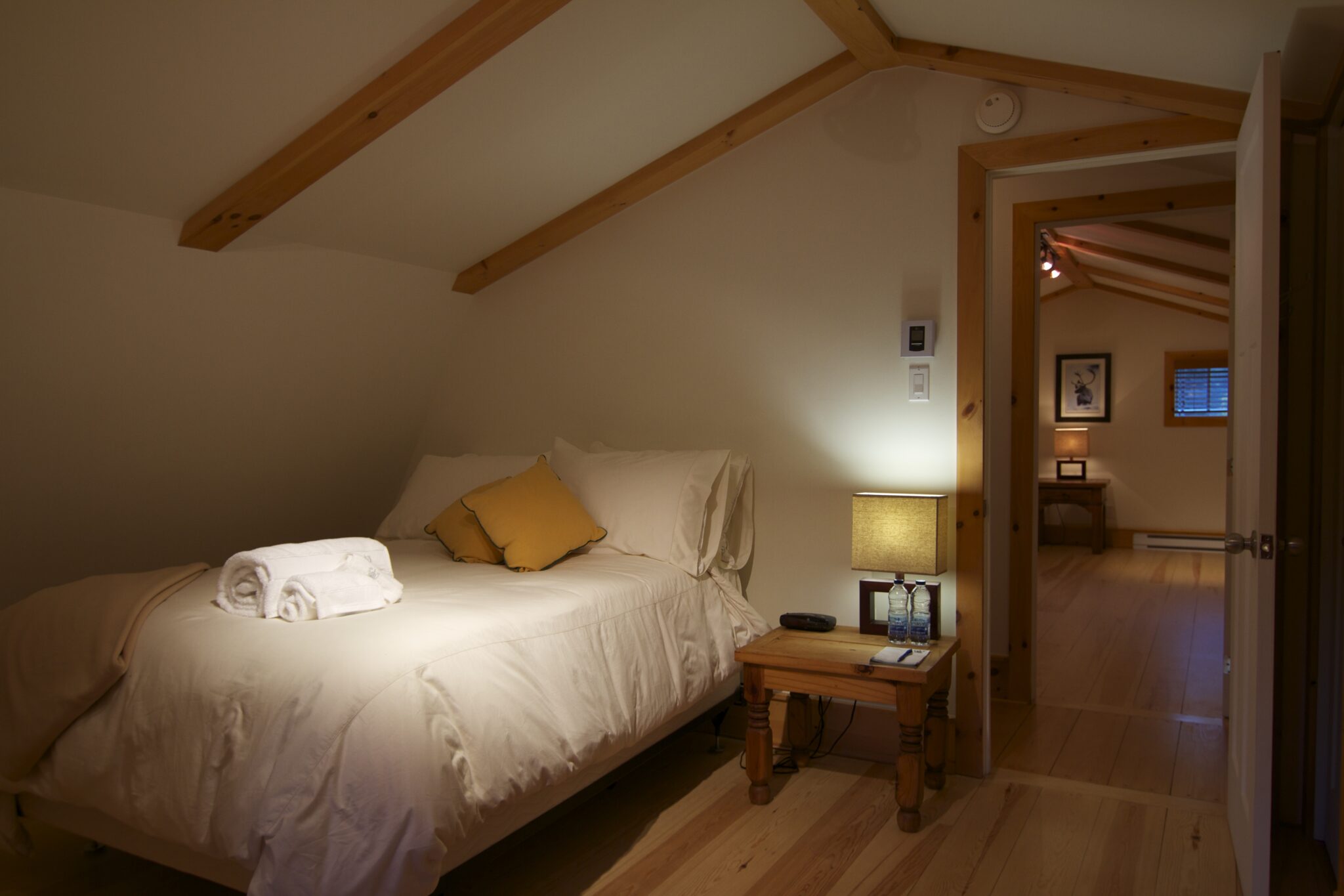 Cosy bedroom in Canadian timber frame alpine home